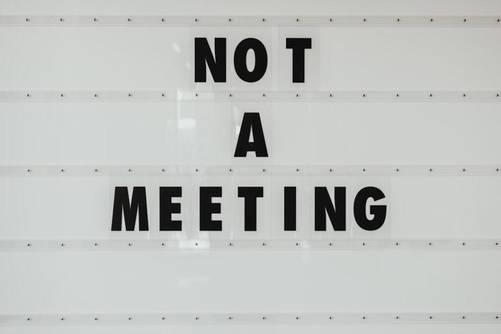 AI Meeting Transcription and Action Items: Automated Post-Call Workflows with Claude automated meeting notes AI — photo by Bernard Hermant on Unsplash